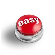 A red Staples Easy Button used for the “That was easy” slogan.