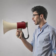 A person speaking rapidly during a conversation.