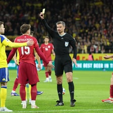 A referee officiating a FIFA soccer match