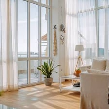 A bright, spacious room with large windows