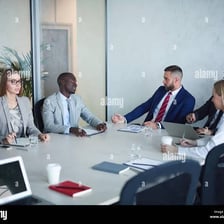 Corporate chief executive officers meeting in a boardroom