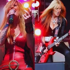 Lita Ford performing with a guitar