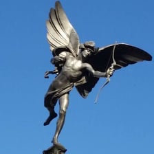 A statue or artistic depiction of Eros, the Greek god of love.