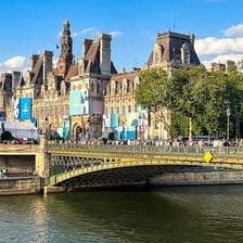 The Seine River flowing through Paris beneath its bridges