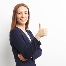 A person making an OK hand gesture