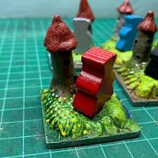 A Kingdomino starting tile featuring a castle