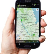 A smartphone displaying a Google Maps route using location technology