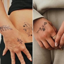 A small tattoo visible on a person’s skin.