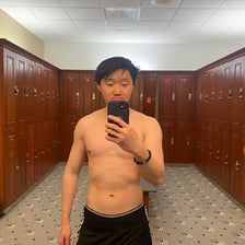 A lean athlete with a visibly strong, wiry build.