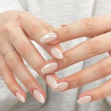 A manicure featuring oval-shaped fingernails