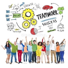 A cohesive team celebrating a shared success.