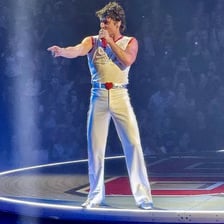 Singer Benson Boone performing on stage