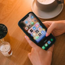 Person interacting with an app on a smartphone