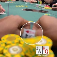 Poker chips placed in the center of a table before a hand.