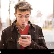 A person checking updates on a smartphone.