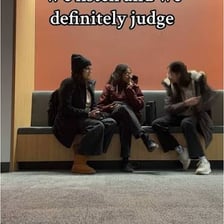 A person seated and prepared to listen to a friend