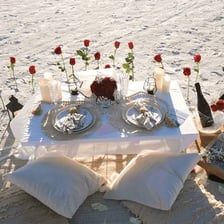 A couple enjoying an inexpensive picnic date.