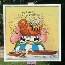 Asterix and Obelix with a wild boar in an illustration