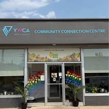 A YWCA community center building with the organization’s name displayed