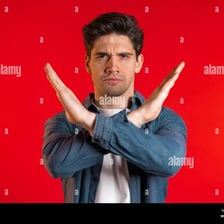 A person expressing disapproval with a raised finger.