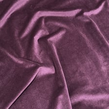 A close-up view of the soft, pile-covered surface of velvet fabric