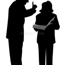 A person following instructions given by a supervisor.