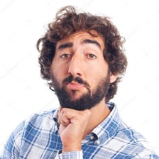 A focused person attentively watching something.