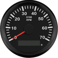 A car engine being revved with the tachometer showing high RPM.