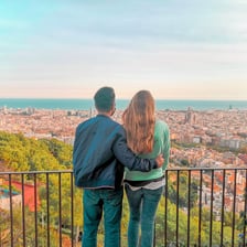A couple embracing in a Spanish setting