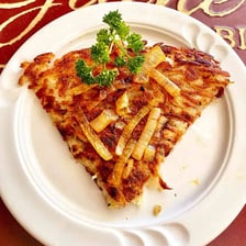 A serving of golden crispy hash browns