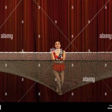 A safety net beneath a circus acrobat