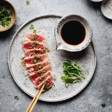 Slices of lightly seared ahi tuna served as tataki.