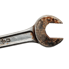 A metal tool covered in reddish-brown rust