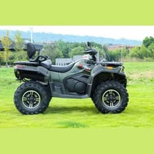 A four-wheel-drive all-terrain vehicle with a straddling seat and handlebars.