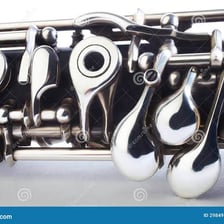 A black oboe with silver keys