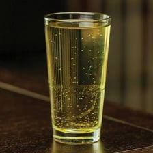 A glass of sparkling ginger ale