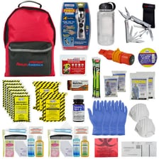 A packed emergency backpack containing basic supplies
