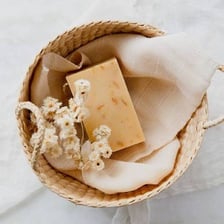 A bar of soap covered in suds.