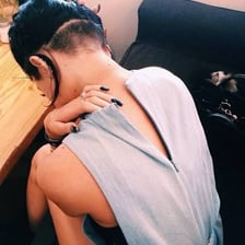 The back of a person’s neck beneath the hairline.