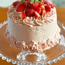 A cake covered with a smooth layer of icing.