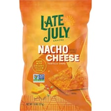 A tortilla chip covered with melted cheese