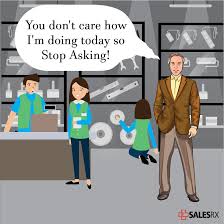 A shop employee assisting a customer at a counter