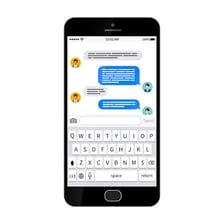 A phone displaying a casual text-message abbreviation.