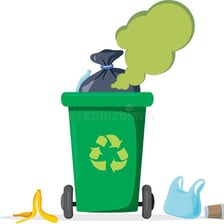 An open garbage bin containing discarded food and waste.