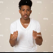 A person reacting with surprise to unexpected information