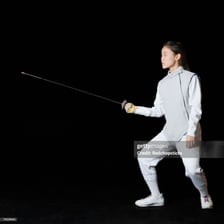 A fencer holding a foil