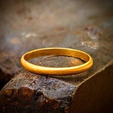 Gold jewelry labeled or described as 24 karat.
