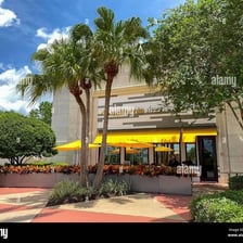 A California Pizza Kitchen restaurant with its recognizable branding