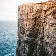 Shelf-like rock ledges jutting from a cliff.