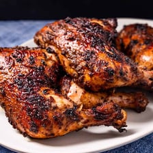Spicy grilled Jamaican jerk chicken with traditional seasoning